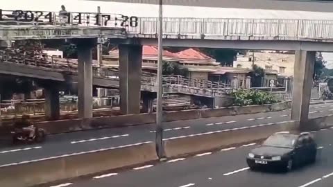 Truck hits overpass