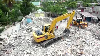 Tropical Storm Grace slows Haiti rescue efforts