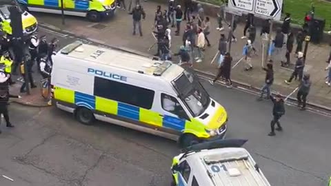 Chaos on the streets of South London. Mobs wielding sticks seen clashing with the police.