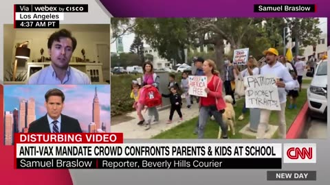 _This is rape__ Protesters yell at parents walking with masked kids at school event