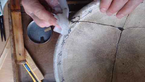 Traditional, lacquer based kintsugi, shaping sabi on mortar