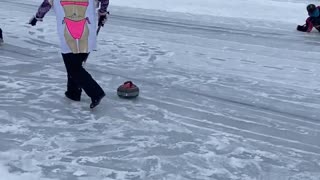 Curling Player Takes Hard Fall on Ice