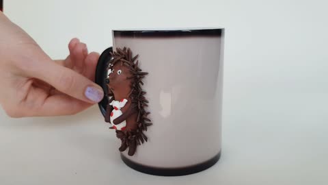Mug chameleon hedgehog in the fog. Gift hedgehog made of polymer clay on a white cup by AnneAlArt.