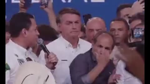 The president of Brazil had to fight for space with his interpreter