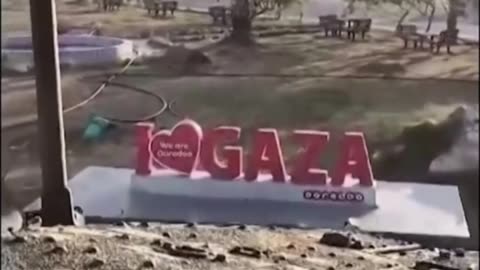 Crazy parenting / I love Gaza sign crushed