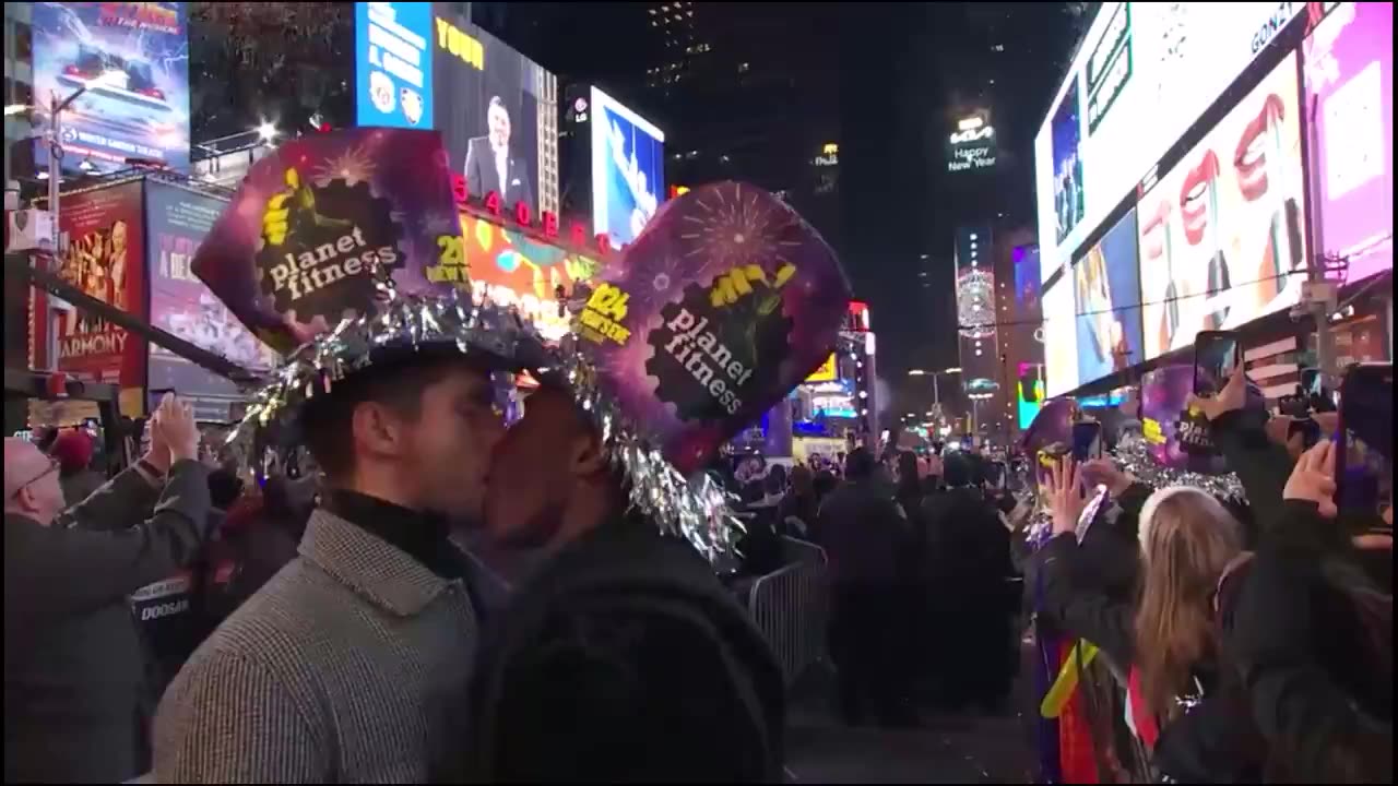 CNN s first shot after the ball drop appears to be an interracial gay kiss