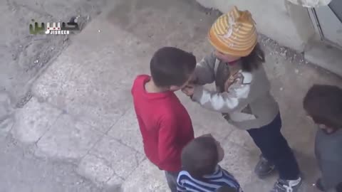 Syrian Child share Piece of Bread with Starving Friends