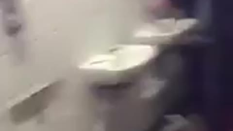 VIDEO: Shocking Footage As Man City Fans Annihilate Old Trafford Toilets