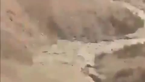 Saudi F-15 fighter jet hits a Qasef-2k drone of the Yemeni Houthis with an air-to-air missile.