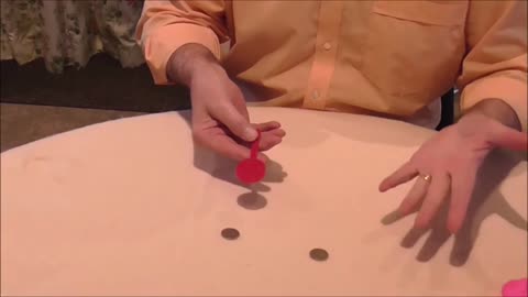 A Plastic Paddle Magically Produces Many Coins