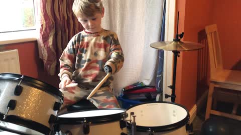 Sol practicing on his new drum kit