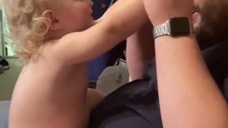 Dad & baby playing a learning game