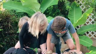 Family pyramid stacked with baby on top