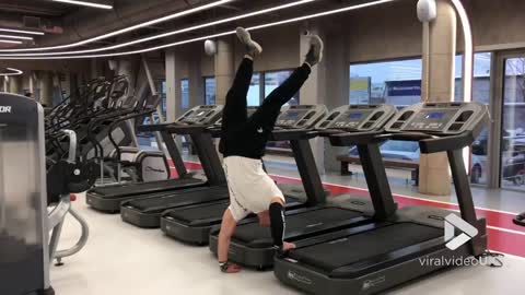 Treadmill handstand