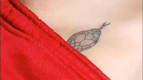 Below Belly Tattoo