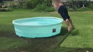 Bellyflop in blue kiddie pool