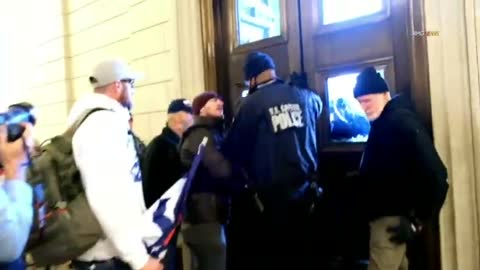 Rioter Scolds Capitol Policeman