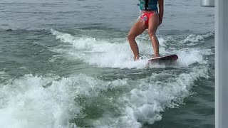 Girl Learning How to Wakesurf Goes Under