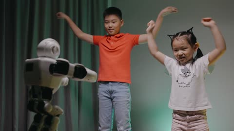 This two toddler dancing like a Robot