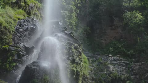 water falling over rocks