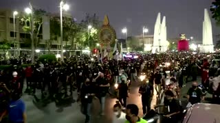Thai protesters hurl paint, firecrackers at police