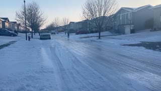 Kid Ice Skates In The Streets Of Lincoln