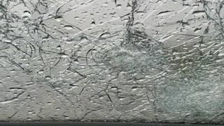 Hail Destroys Driver's Windshield