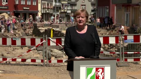 At German flood site, Merkel pledges financial aid