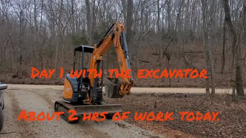 Mini-excavato, diggingvavditch down the edge of my driveway