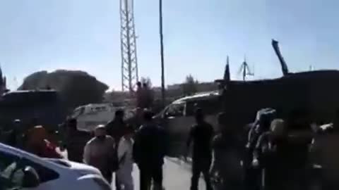 SYRIA – Residents of Kobani cast stones at Russian vehicles