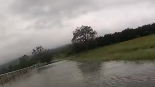 Police rescue men and their dogs from rising floodwaters