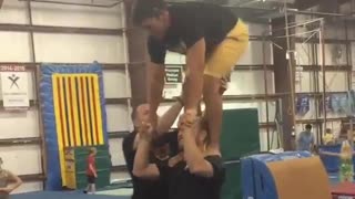 Cheerleader falls after failed flip