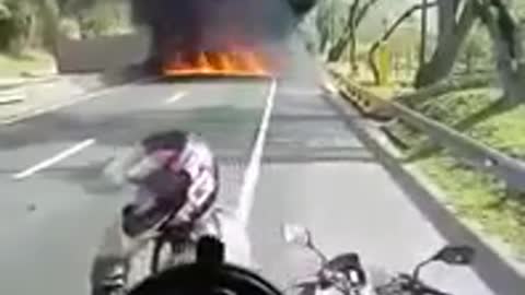 Angel dressed in white who appears in the video and saves truck driver from explosion