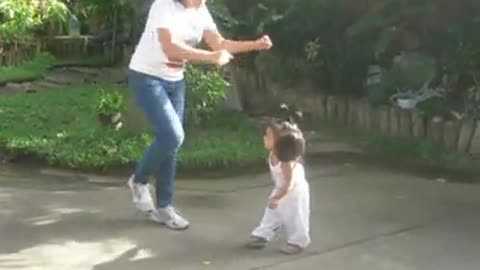 Mother and 2 Year Old Baby Girl Dance The Running Man