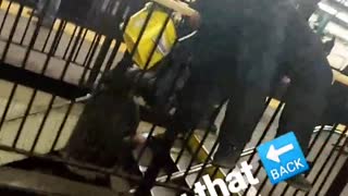 Cracking that back man lays on subway stairs railing