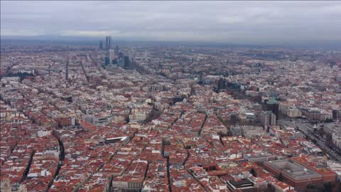 large aerial view of madrid business center in background cloudy winter day