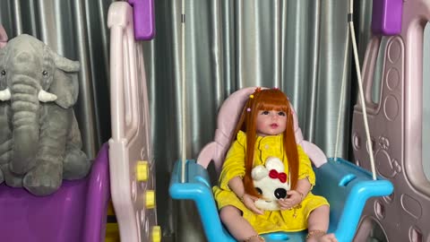 Doll playing rocking chair, swinging on a swing, riding a rocking horse video