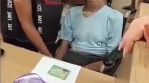 Woman accompanied a deceased man to bank in wheelchair to request a loan