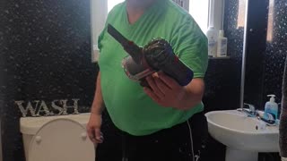 Woman Fools Dad with Toy Vacuum