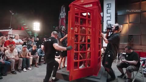 Russian Fighter Gets Lit Up With A Mean Combo During A Boxing Match Inside A Phone Booth