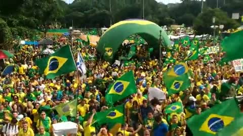 Screaming for help, crowd of Brazilians protest in the streets of the country