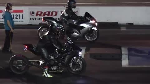 Drag racing between superbikes H2, ZX14, and GSXR