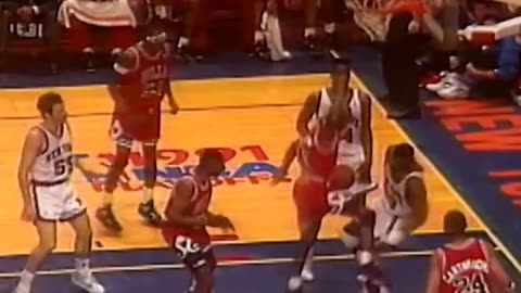 Michael Jordan dunks on Patrick Ewing