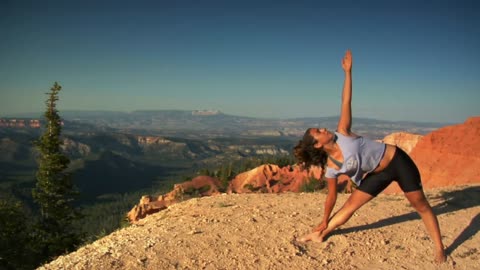 Women stretching near the cliff