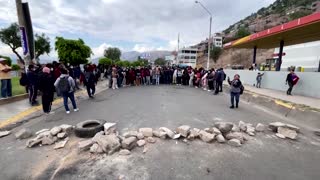 Student protesters set door of Peru university ablaze