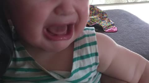 Baby crying in slow motion