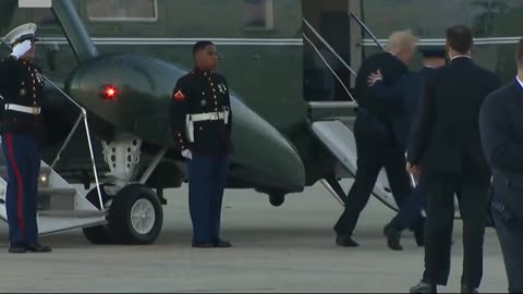 Trump stops to retrieve Marine's hat