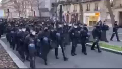 French Police March With Protesters
