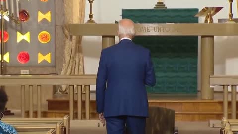 Joe Biden walking away with his back to his attendees then whispering mode