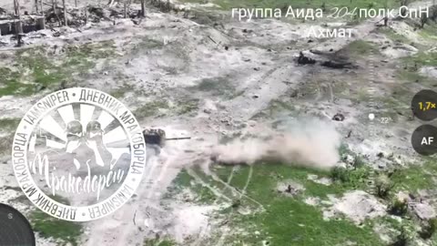 Russian Tank Attacks Ukrainian Positions While Under Fire From Enemy FPV Drones.